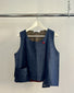 Gilet asimmetrico con tasca color jeans
